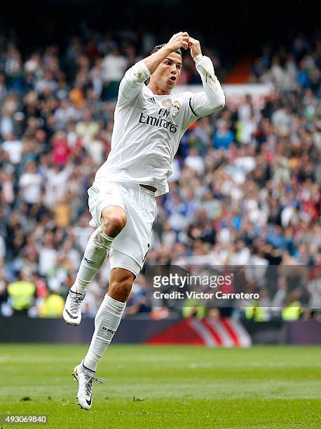 Cristiano Ronaldo of Real Madrid celebrates after scoring his team's second goal during the La Liga match between Real Madrid CF and Levante UD at...