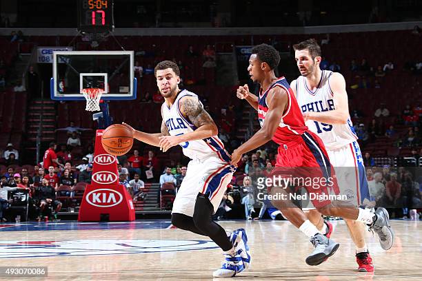 Scottie Wilbekin of the Philadelphia 76ers drives to the basket against the Washington Wizards during the preseason game on October 16, 2015 at Wells...