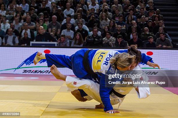 Telma Monteiro of Portugal attacks Sumiya Dorjsuren of Mongolia during the -57kg Final of the Paris Grand Slam 2015 at the Palais Omnisports de...