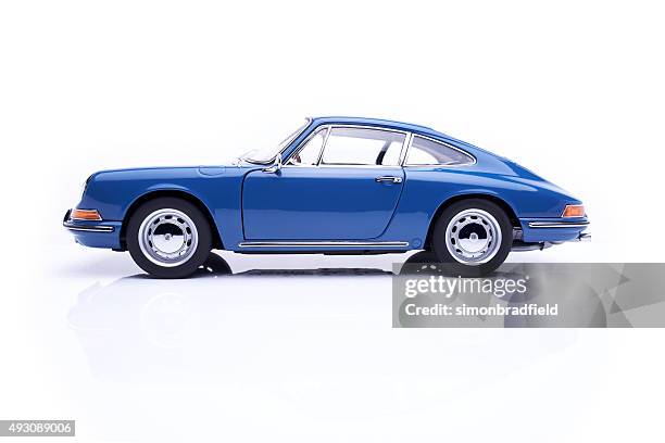 classic porsche 911 model on white - 20th century model car stock pictures, royalty-free photos & images