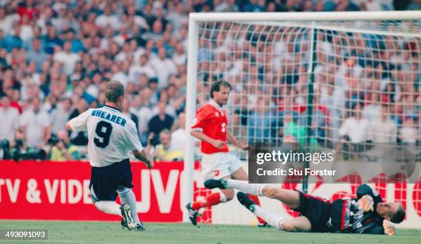 England player Alan Shearer scores the third goal during the European Championship Finals group match between England and Holland at Wembley, on June...