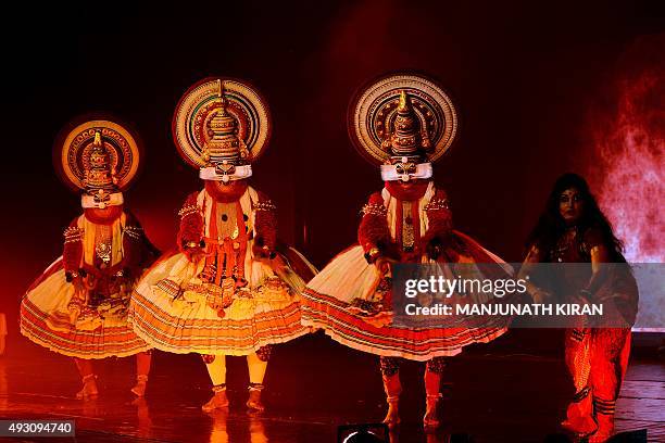 Indian dancers perform 'Kathakali,' a traditional dance form from the state of Kerala, during "Cilappatikaram-Tale of an Anklet" dance opera in...