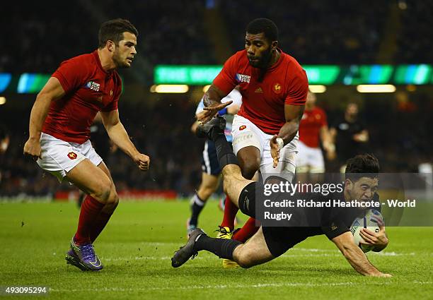 Nehe Milner-Skudder of the New Zealand All Blacks dives over to score his side's second try during the 2015 Rugby World Cup Quarter Final match...