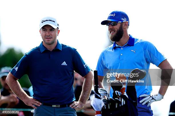 Martin Laird of Scotland and Graham DeLaet of Canada talk on the second tee during the third round of the Frys.com Open on October 17, 2015 at the...