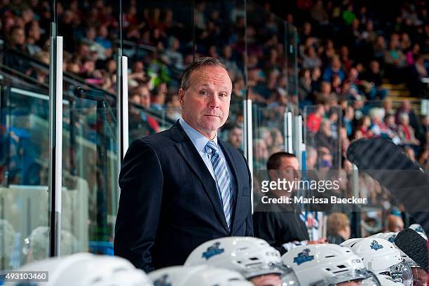 Dave Lowry, head coach of the Victoria Royals stands on the bench against the Kelowna Rockets on October 9, 2015 at Prospera Place in Kelowna,...