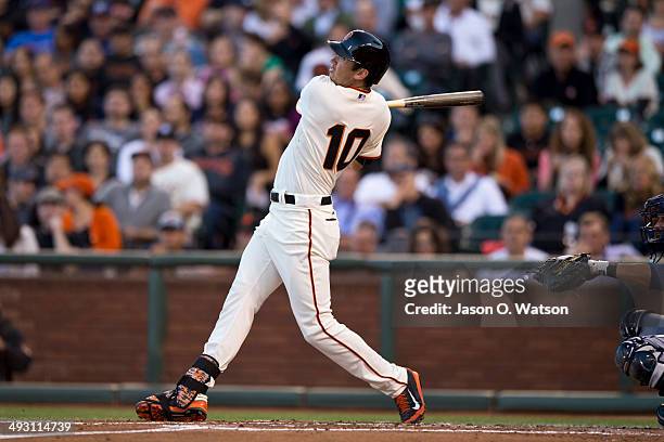 Tyler Colvin of the San Francisco Giants hits a home run against the Atlanta Braves during the second inning at AT&T Park on May 12, 2014 in San...