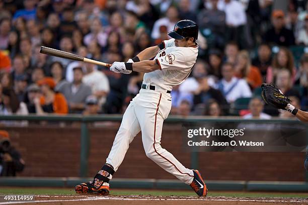 Tyler Colvin of the San Francisco Giants hits a home run against the Atlanta Braves during the second inning at AT&T Park on May 12, 2014 in San...