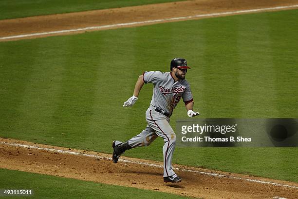 Kevin Frandsen of the Washington Nationals runs after his hit against the Houston Astros at Minute Maid Park on April 30, 2014 in Houston,Texas.
