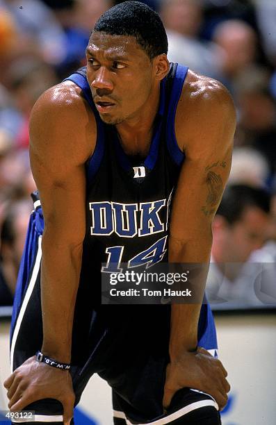 Nate James of the Duke Blue Devils rests on the court during the Wooden Classic against the USC Trojans at the Arrowhead Pond in Anaheim, California....