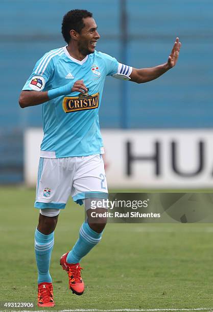 Carlos Lobaton of Sporting Cristal celebrates after scoring the first goal of his team against Deportivo Municipal during a match between Sporting...