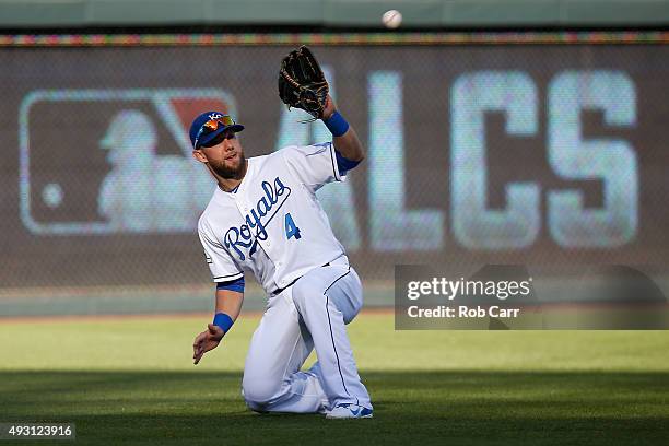 Alex Gordon of the Kansas City Royals catches a ball hit by Ben Revere of the Toronto Blue Jays during the fifth inning in game two of the American...