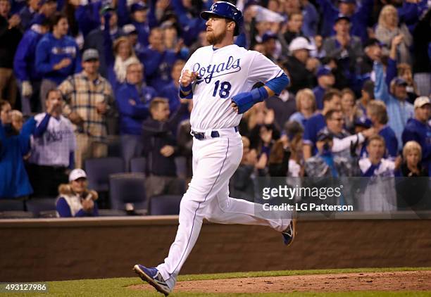 Ben Zobrist of the Kansas City Royals scores in the bottom of the eighth inning of Game 1 of the ALCS against the Toronto Blue Jays at Kauffman...