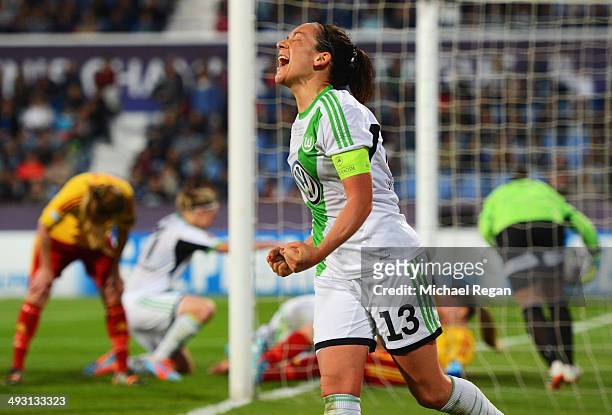 Nadine Kessler of VfL Wolfsburg celebrates as Martina Mueller of VfL Wolfsburg scores their fourth goal during the UEFA Women's Champions Final match...