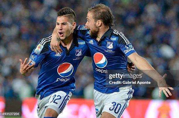 Jonathan Agudelo of Millonarios celebrates with Federico Insua after scoring the second goal of his team during a match between Millonarios and...