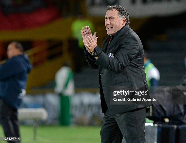 Ruben Israel coach of Millonarios claps his hands during a match between Millonarios and Jaguares FC as part of round 16 of Liga Aguila II 2015 at...