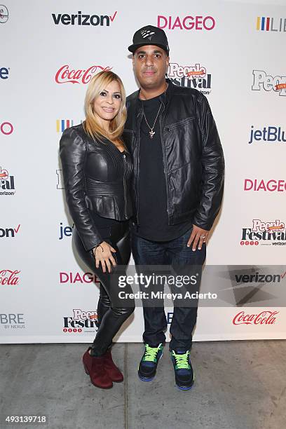 Denise Garcia and DJ Logo attend the 4th Annual People en Espanol Festival at Jacob Javitz Center on October 17, 2015 in New York City.