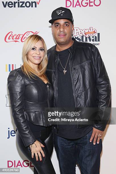 Denise Garcia and DJ Logo attend the 4th Annual People en Espanol Festival at Jacob Javitz Center on October 17, 2015 in New York City.