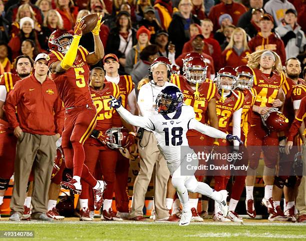 Wide receiver Allen Lazard of the Iowa State Cyclones pulls in a reception over safety Nick Orr of the TCU Horned Frogs in the first half of play at...