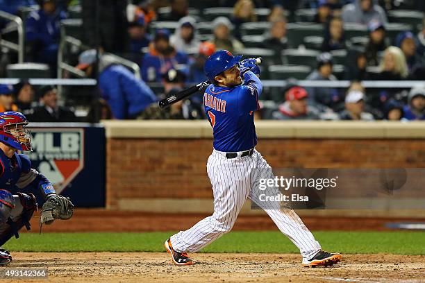 Travis d'Arnaud of the New York Mets hits a solo home run in the sixth inning against Jon Lester of the Chicago Cubs during game one of the 2015 MLB...