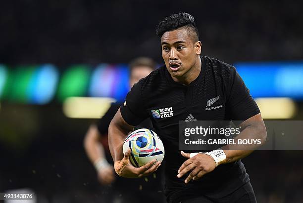 New Zealand's wing Julian Savea runs to score his team's third try during a quarter final match of the 2015 Rugby World Cup between New Zealand and...