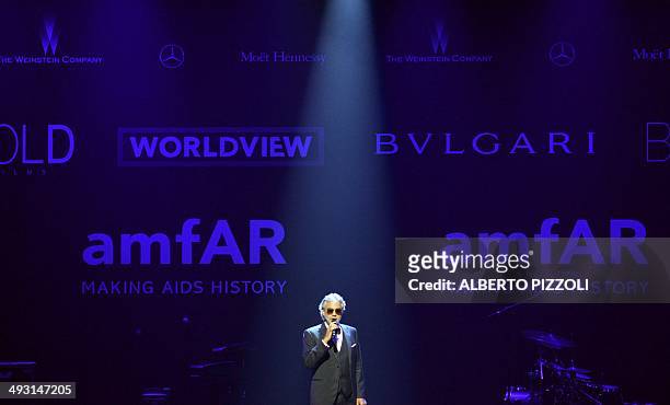 Italian opera singer Andrea Bocelli performs during the amfAR 21st Annual Cinema Against AIDS during the 67th Cannes Film Festival at Hotel du...