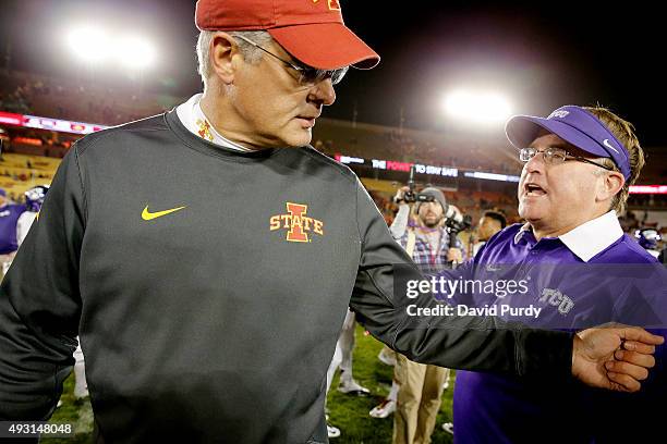 Head coach Paul Rhoads of the Iowa State Cyclones, left, meets with head coach Gary Patterson of the TCU Horned Frogs at mid field after TCU defeated...