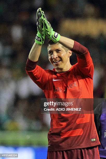 Pumas's goalkeeper Miguel Palacios celebrates after the end of the match against Leon during their Mexican Apertura tournament football match at the...