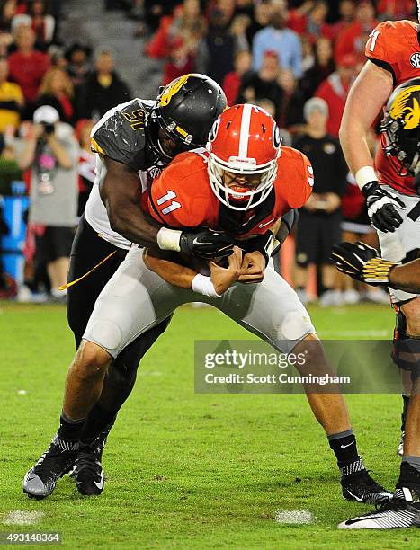 Charles Harris of the Missouri Tigers sacks Greyson Lambert of the Georgia Bulldogs on October 17, 2015 in Atlanta, Georgia. Photo by Scott...