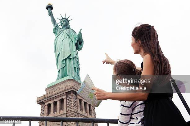 woman with daughter traveling - visit us stock pictures, royalty-free photos & images