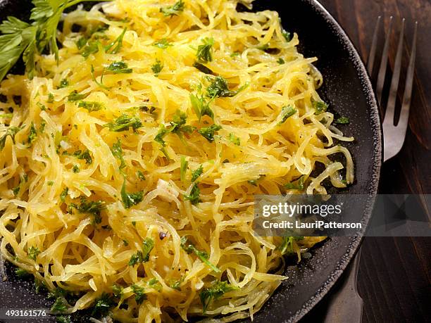 spaghetti squash with garlic herb butter - spaghetti squash stock pictures, royalty-free photos & images