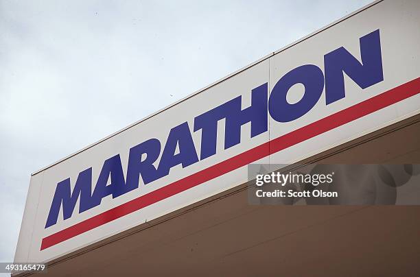 Sign marks the location of a Marathon gas station on May 22, 2014 in Chicago, Illinois. Marathon Petroleum Corp. Has agreed to purchase Hess gasoline...