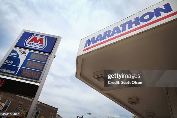Sign marks the location of a Marathon gas station on May 22, 2014 in Chicago, Illinois. Marathon Petroleum Corp. Has agreed to purchase Hess gasoline...