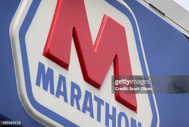Sign marks the location of a Marathon gas station on May 22, 2014 in Chicago, Illinois. Marathon Petroleum Corp. Has agreed to purchase Hess gasoline...
