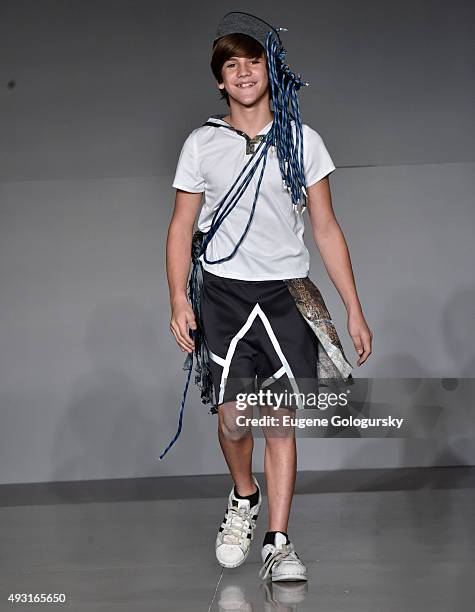 Model, wearing designs from Parsons School of Design, at petitePARADE / Kids Fashion Week, NYC October 2015 at Spring Studios on October 17, 2015 in...