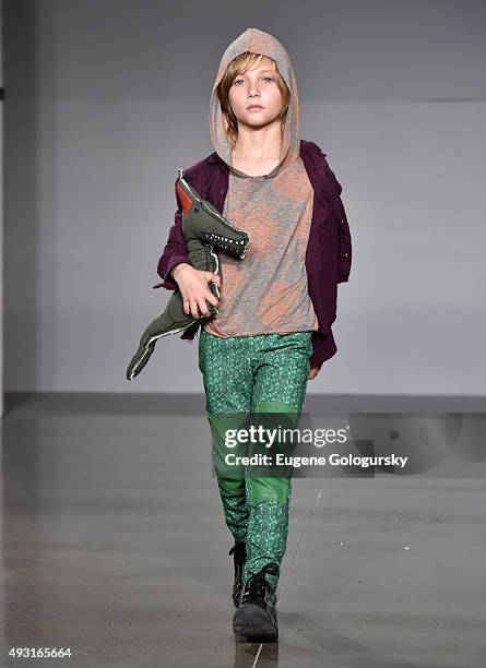 Model, wearing designs from Parsons School of Design, at petitePARADE / Kids Fashion Week, NYC October 2015 at Spring Studios on October 17, 2015 in...