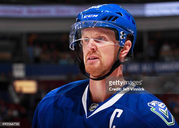 Henrik Sedin of the Vancouver Canucks looks on from the bench during their NHL game against the St. Louis Blues at Rogers Arena October 16, 2015 in...