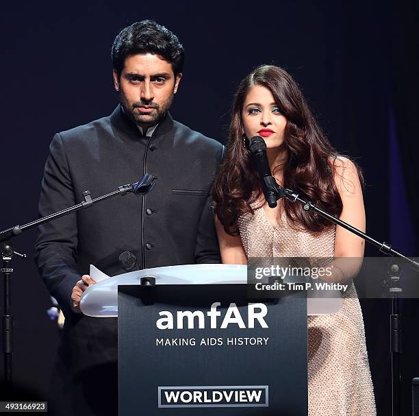 Abhishek Bachchan and Aishwarya Rai speak onstage during amfAR's 21st Cinema Against AIDS Gala Presented By WORLDVIEW, BOLD FILMS, And BVLGARI at...