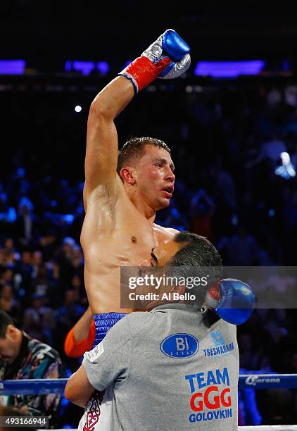 Gennady Golovkin celebrates his eighth round tko against David Lemieux during their WBA/WBC interim/IBF middleweight title unification bout at...