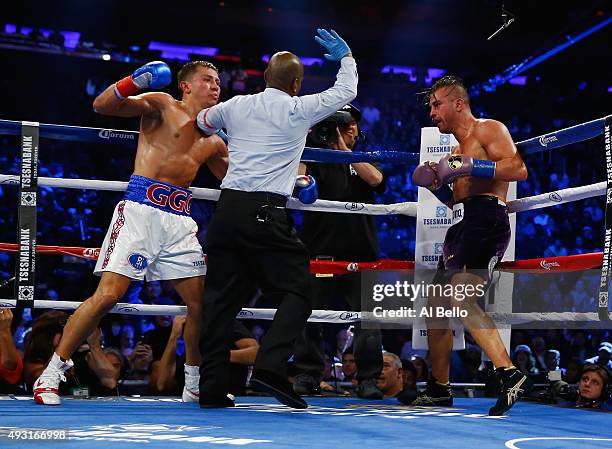 Gennady Golovkin stops David Lemieux via tko in the eighth round during their WBA/WBC interim/IBF middleweight title unification bout at Madison...