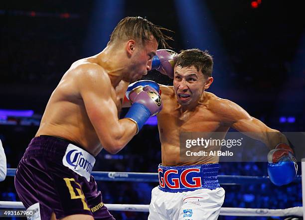 Gennady Golovkin punches David Lemieux during their WBA/WBC interim/IBF middleweight title unification bout at Madison Square Garden on October 17,...