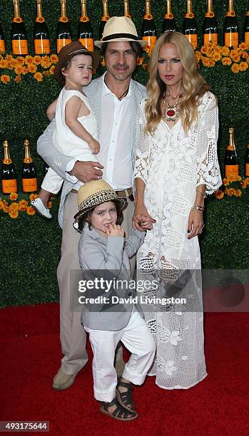 Rodger Berman and wife fashion stylist Rachel Zoe pose with children Kaius Jagger Berman and Skyler Morrison Berman at the Sixth-Annual Veuve...