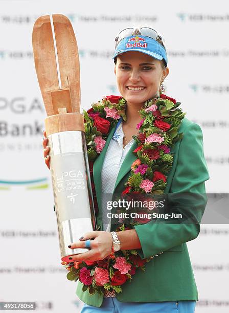 Lexi Thompson of United States lifts the winners trophy during a ceremony following the LPGA KEB HanaBank on October 18, 2015 in Incheon, South Korea.