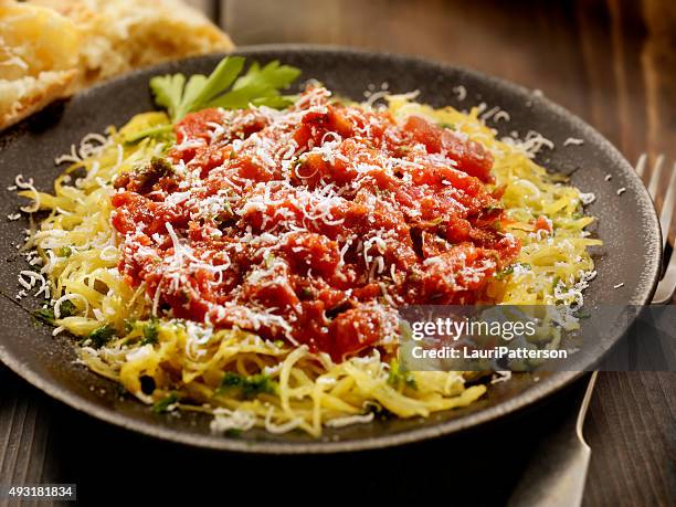 spaghetti squash with tomato sauce - spaghetti squash stock pictures, royalty-free photos & images