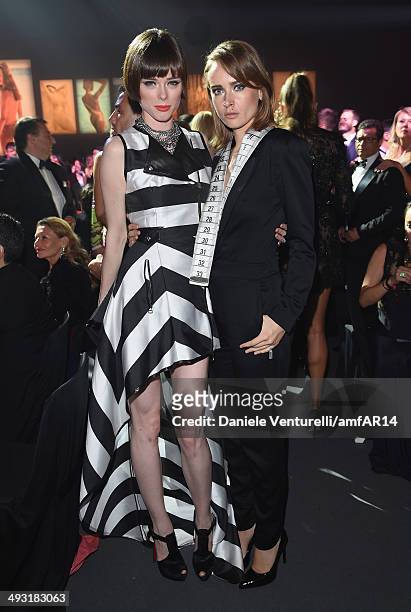 Coco Rocha and Olga Sorokina attend amfAR's 21st Cinema Against AIDS Gala Presented By WORLDVIEW, BOLD FILMS, And BVLGARI at Hotel du Cap-Eden-Roc on...