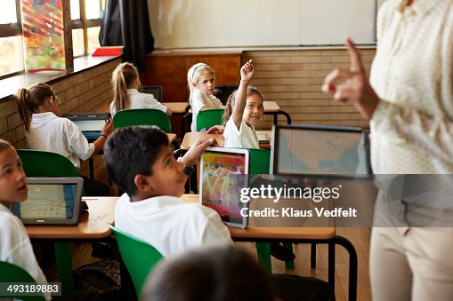 Getting Taught Kids In Schoolclass Getting Taught With Tablets High-Res Stock Photo ...