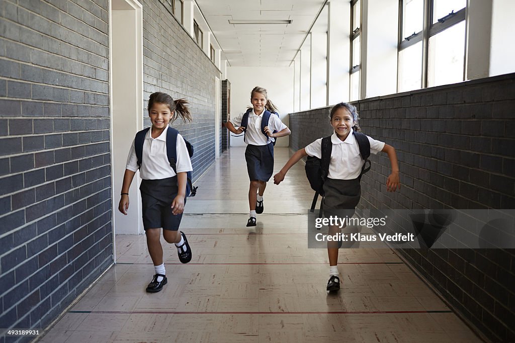 Schoolgirl running in the corridors