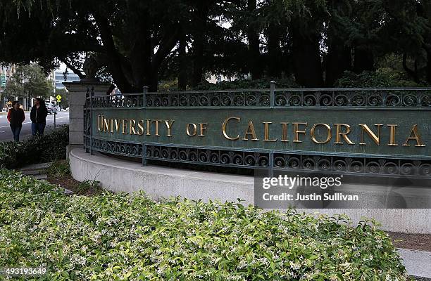 Pedestrians walk by an entrance to the UC Berkeley campus on May 22, 2014 in Berkeley, California. According to the Academic Ranking of World...