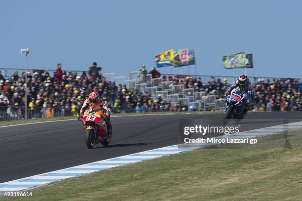 Marc Marquez of Spain and Repsol Honda Team leads Jorge Lorenzo of Spain and Movistar Yamaha MotoGP during the MotoGP race during the MotoGP of...