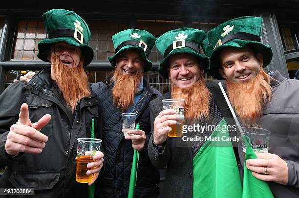 Irish rugby fans pose for a photograph outside a pub close to the Millennium Stadium where Ireland are playing Argentina in the quarter finals of the...