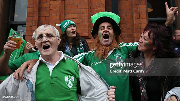 Irish rugby fans sing as they drink outside a pub close to the Millennium Stadium where Ireland are playing Argentina in the quarter finals of the...